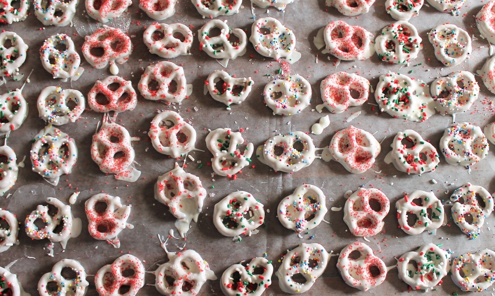Colorful, dipped pretzels with a holiday motif.